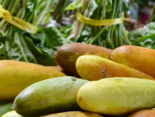 Colorful fresh organic fruit and vegetables for sale at an outdoor market in the Vanuatu capital Port Vila